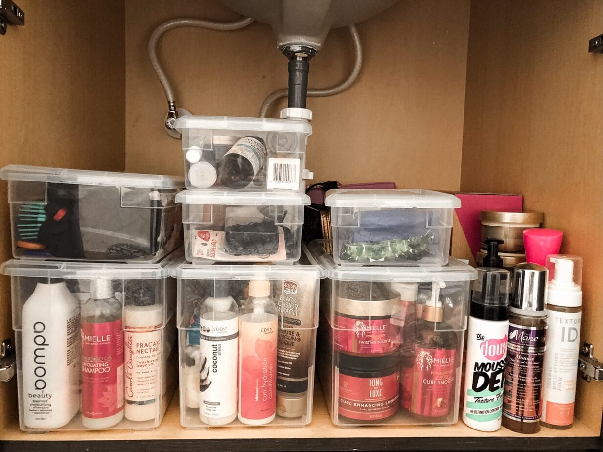So i was wondering if anyone has any storage ideas for curly hair products.  i have a lot. and i mean a lot (as you can see below that's about 3/4 ths